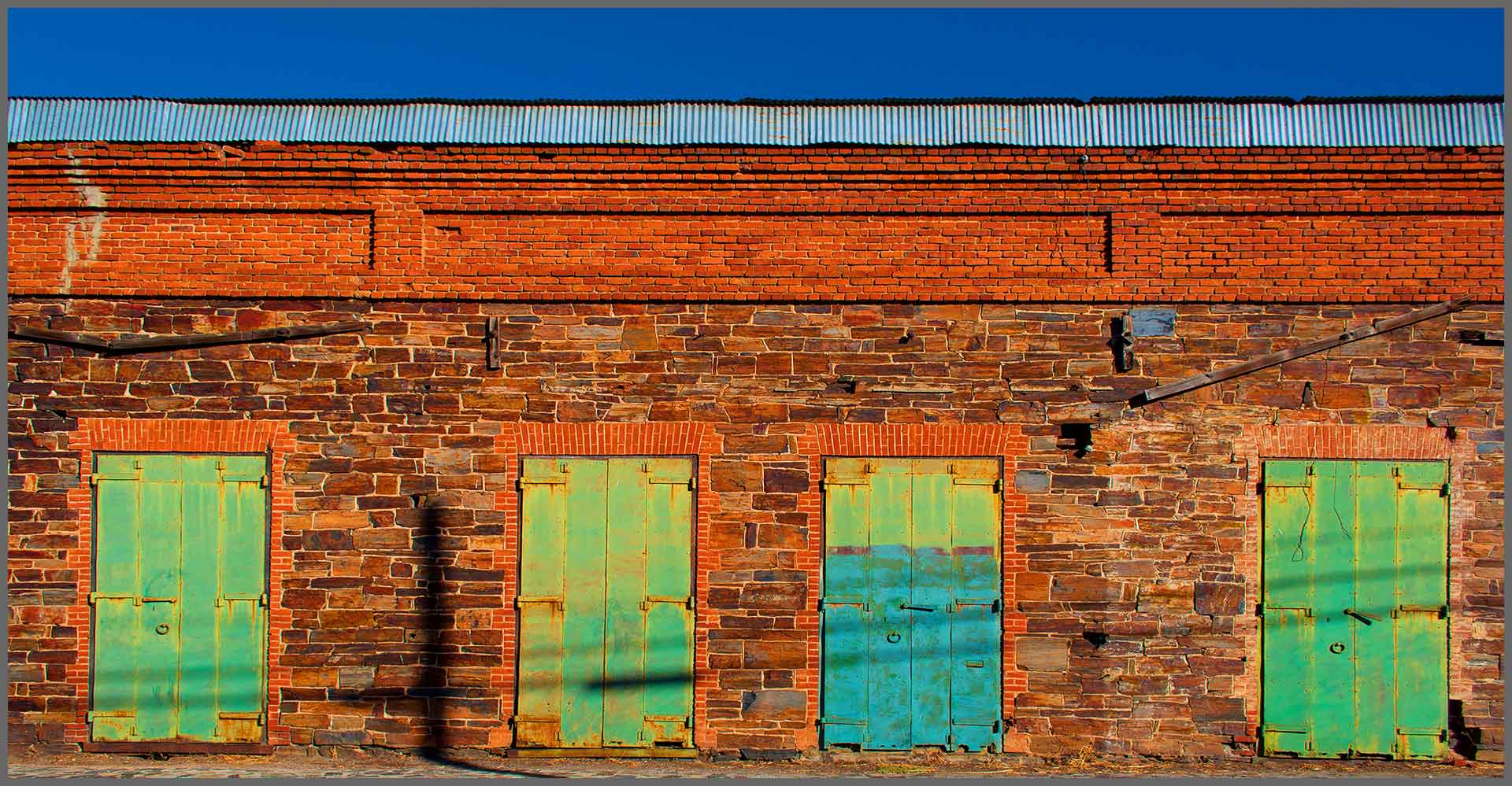 Copper Doors on Brick