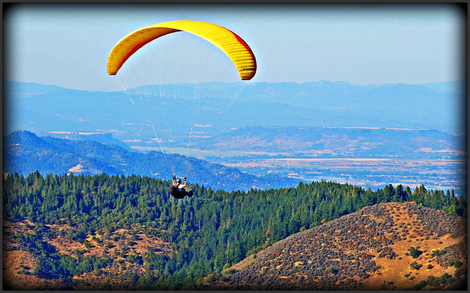 Hang Gliding Pilot over Rogue Valley